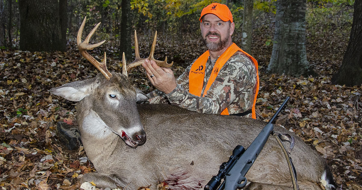 Author Brian Grossman with a nice 9-point buck taken on his 15-acre property.